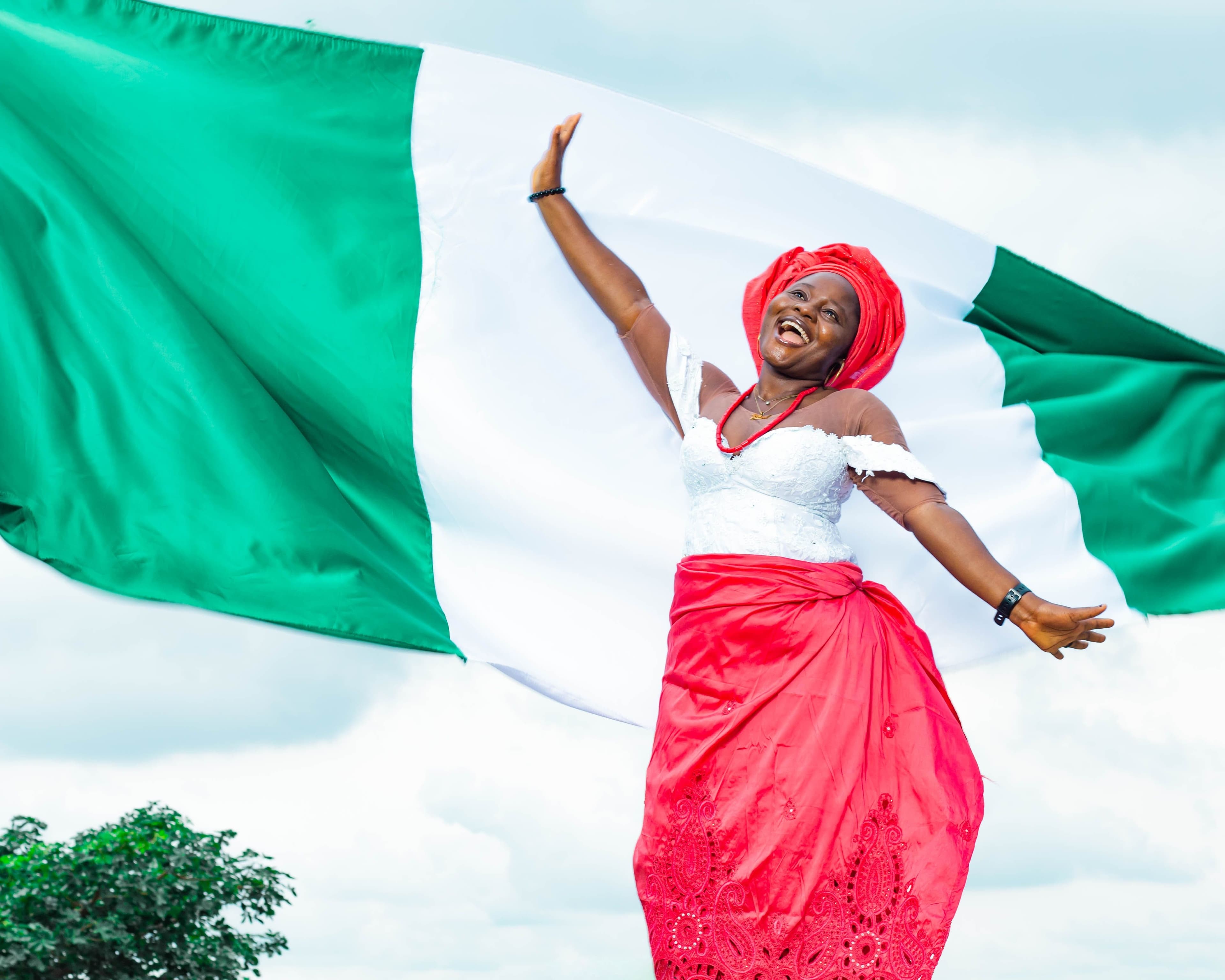 A vibrant street parade celebrating Nigeria's Independence Day